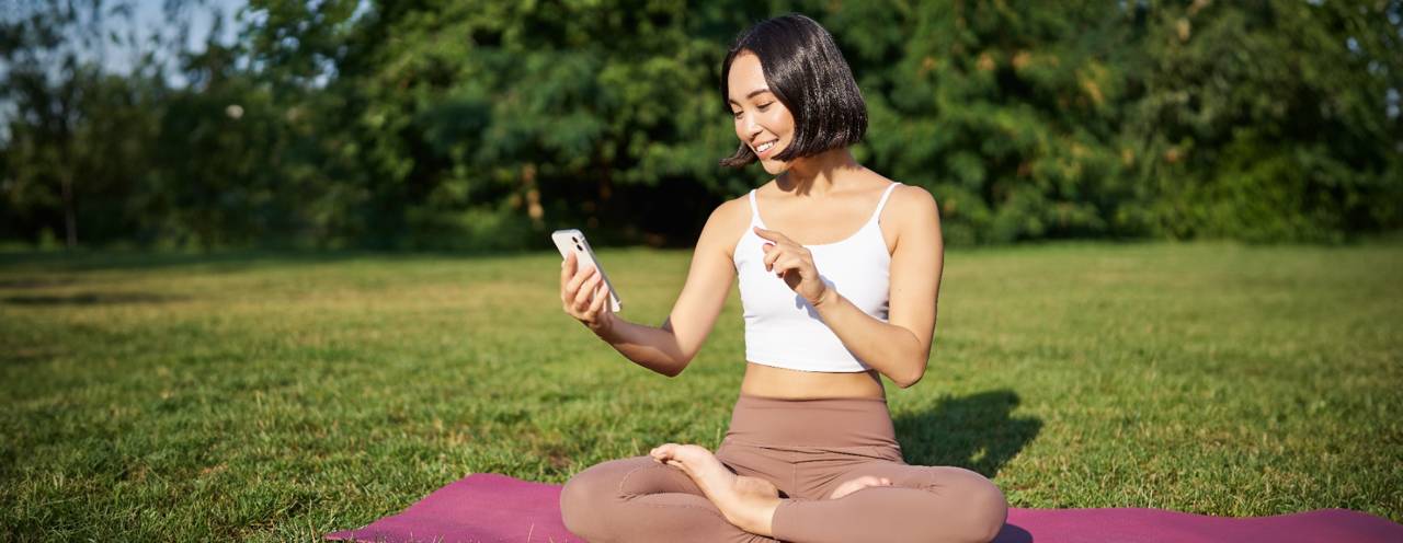 Mindfulness Tools Guide – Woman Using Meditation App Outdoors